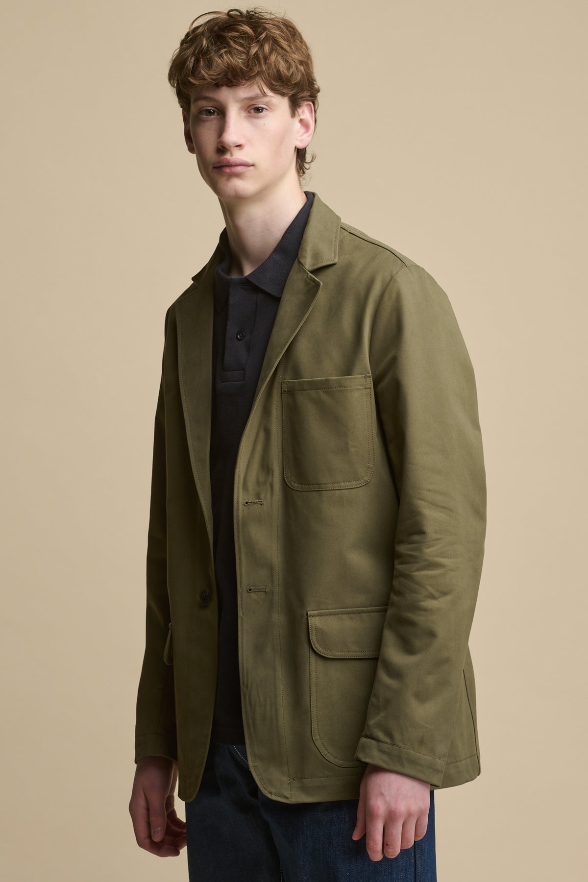 Thigh up image of male wearing Men's James Single Breasted Blazer in olive
