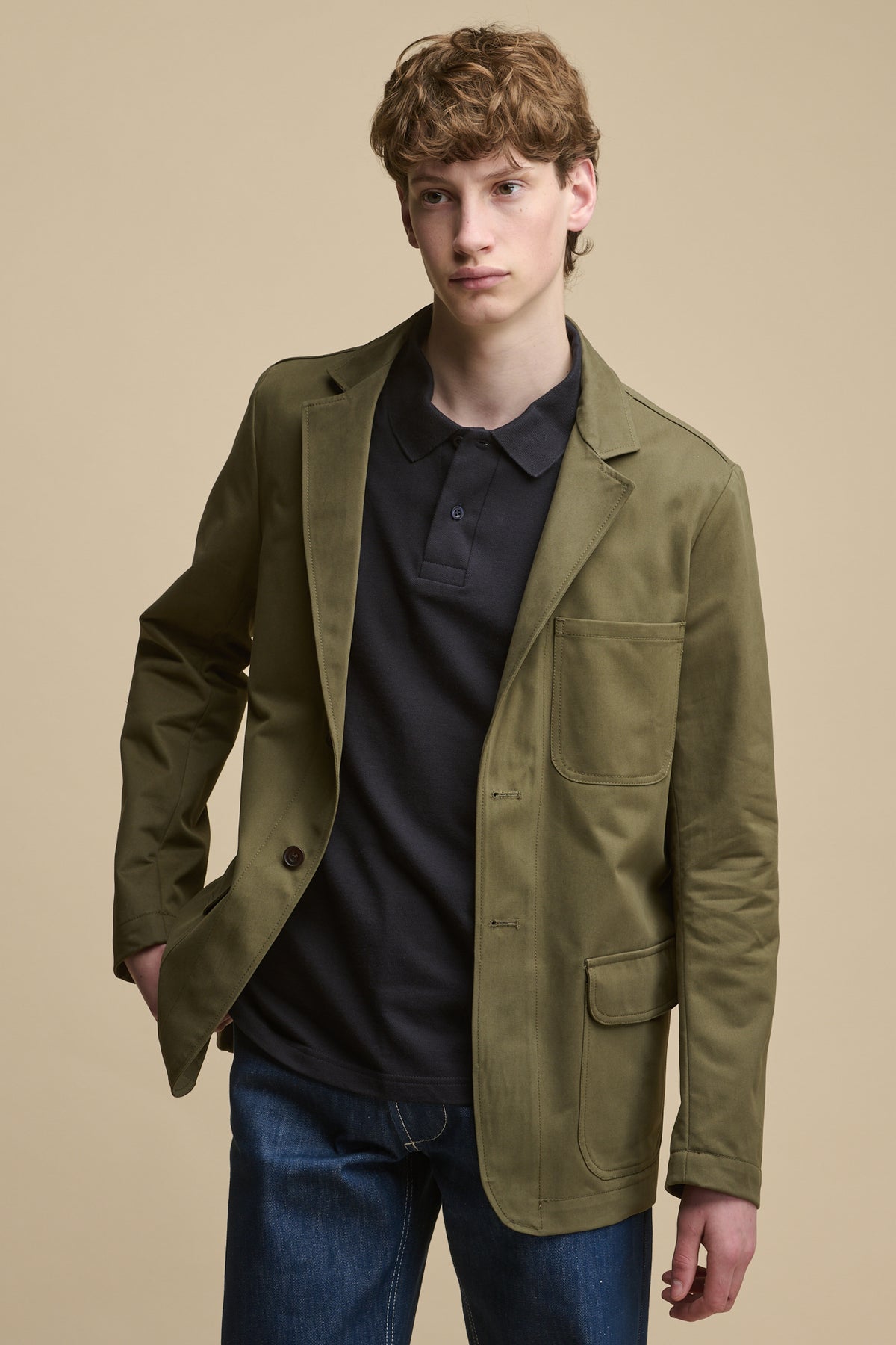 Thigh up image of male wearing Men's James Single Breasted Blazer in olive