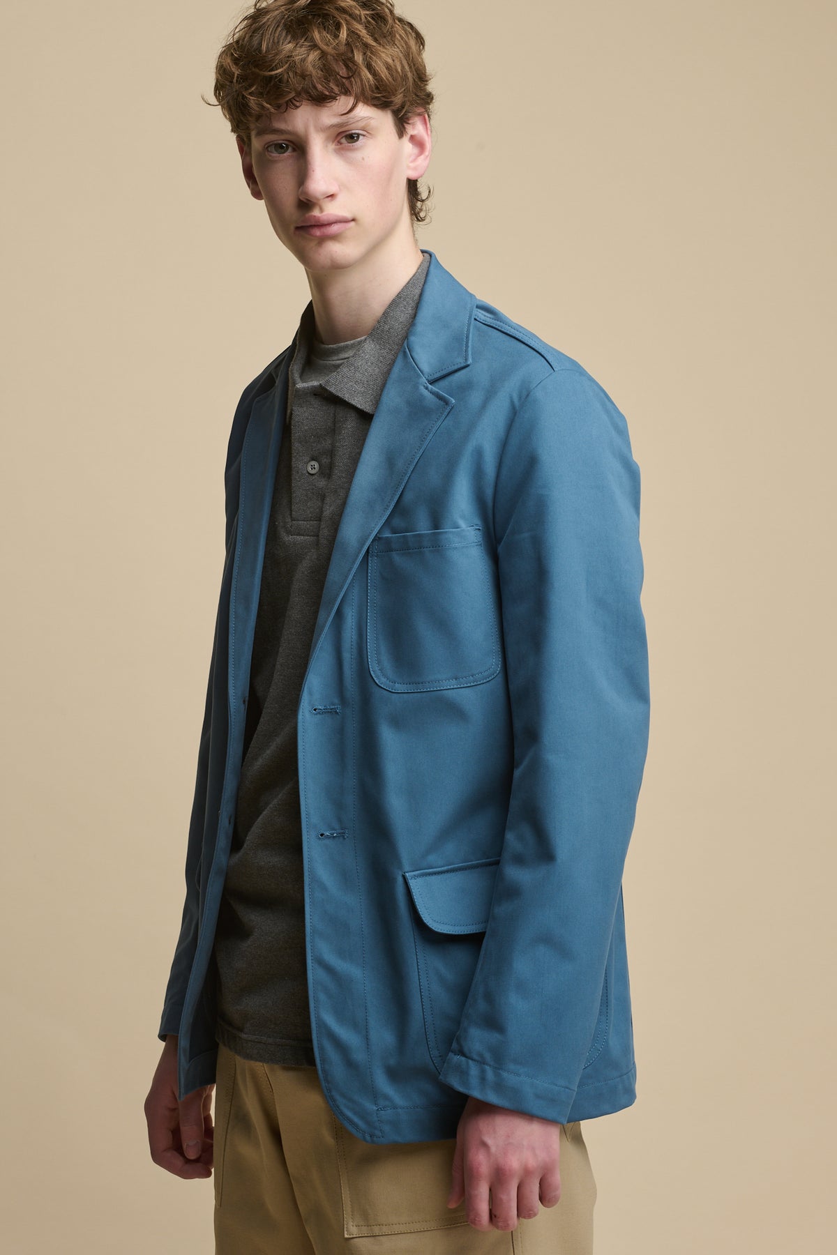 Thigh up image of male wearing Men's James Single Breasted Blazer in RAF Blue