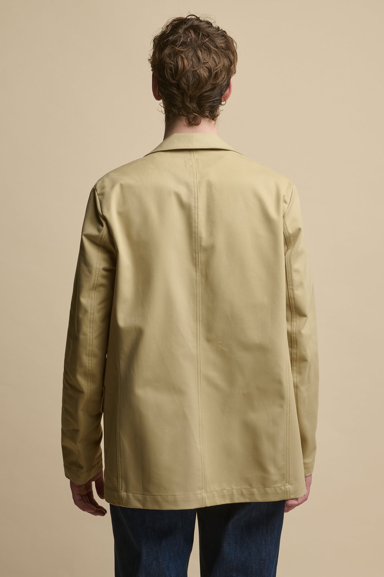 Thigh up image of the back of Men's James Single Breasted Blazer in stone