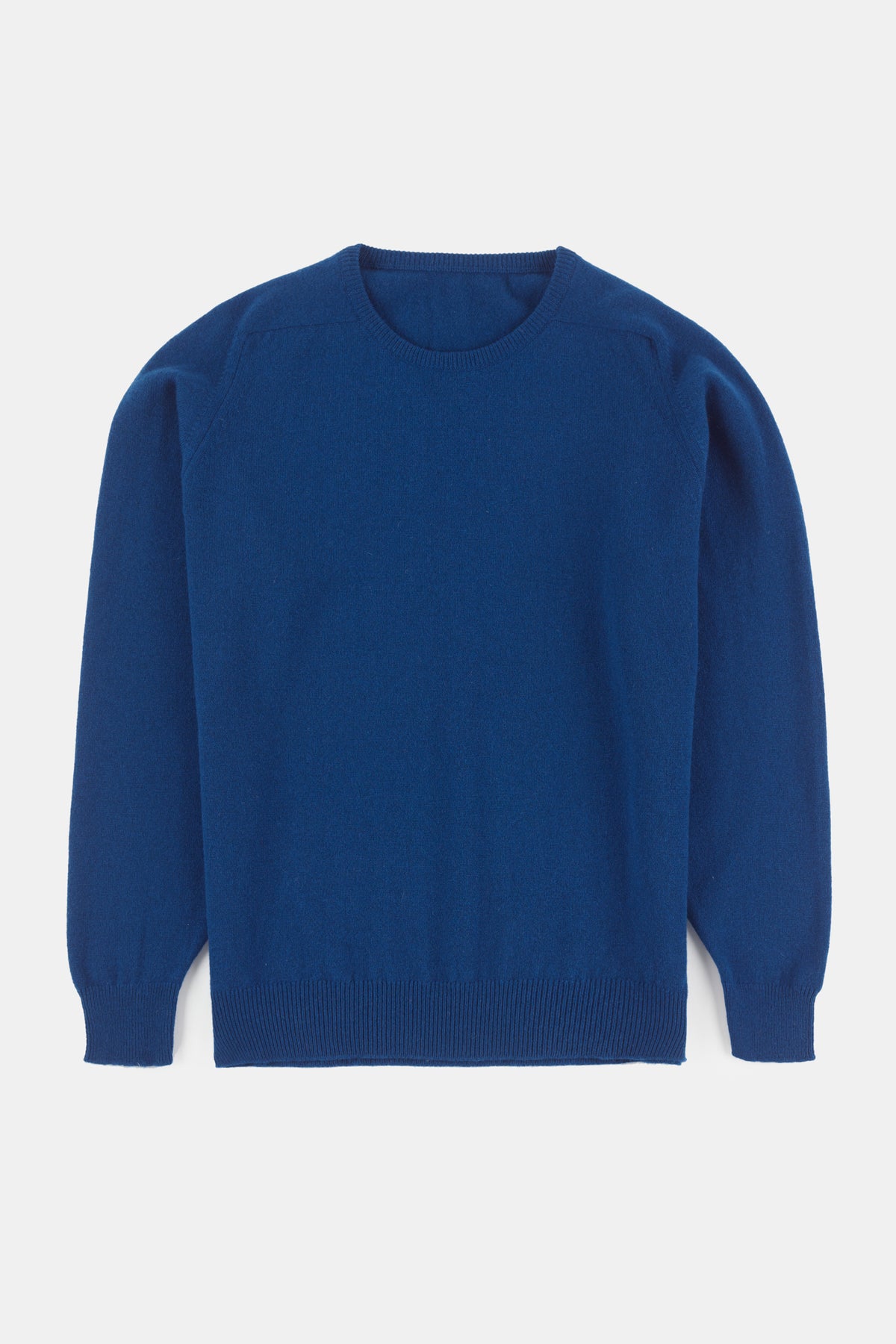 
            Flatlay of men&#39;s lambswool crew neck in bright blue