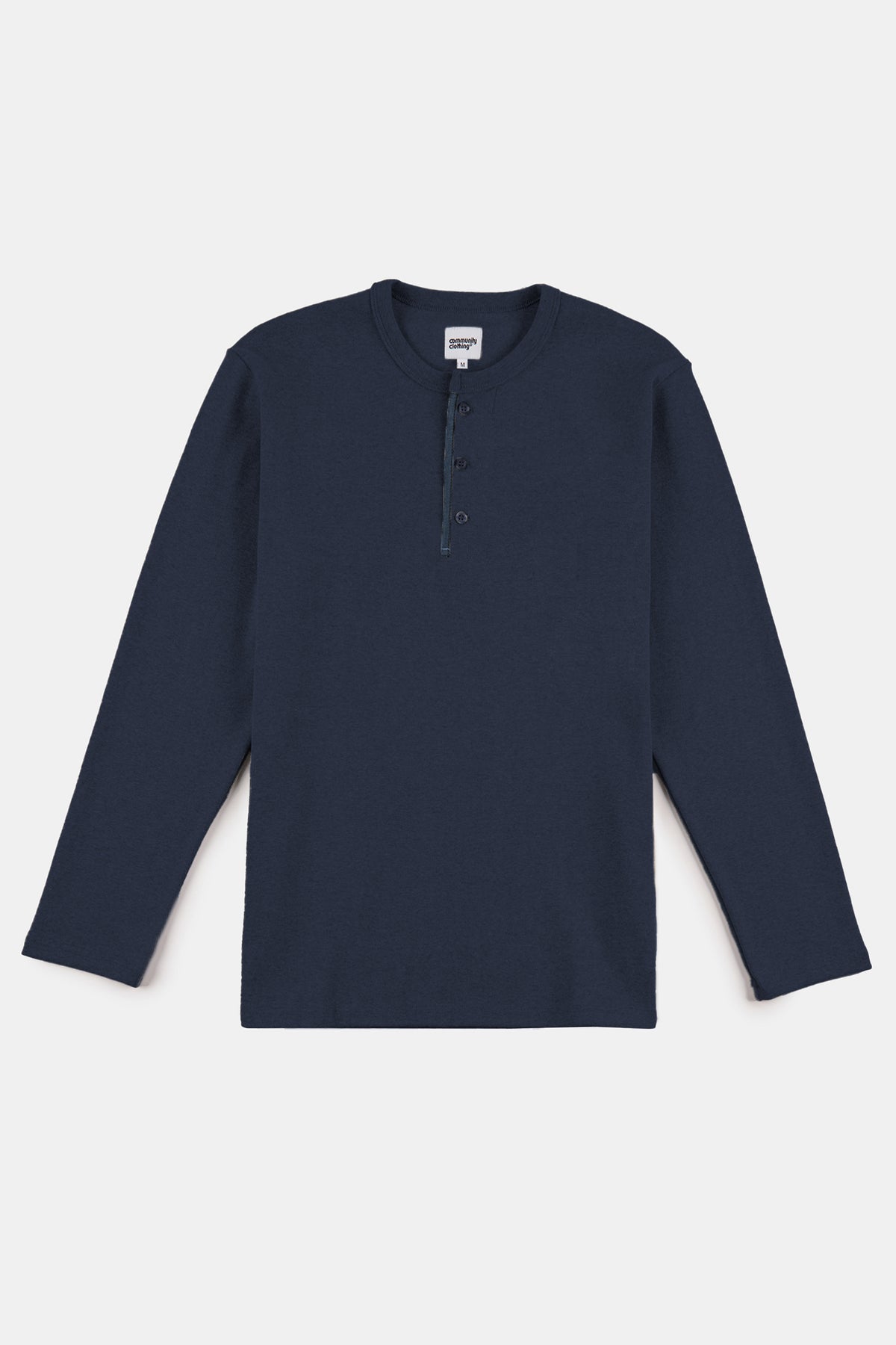 Flatlay product shot of men's long sleeve henley top in navy