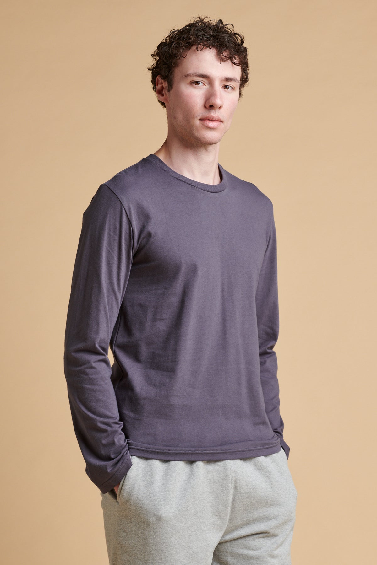Male wearing long sleeve t-shirt in slate grey