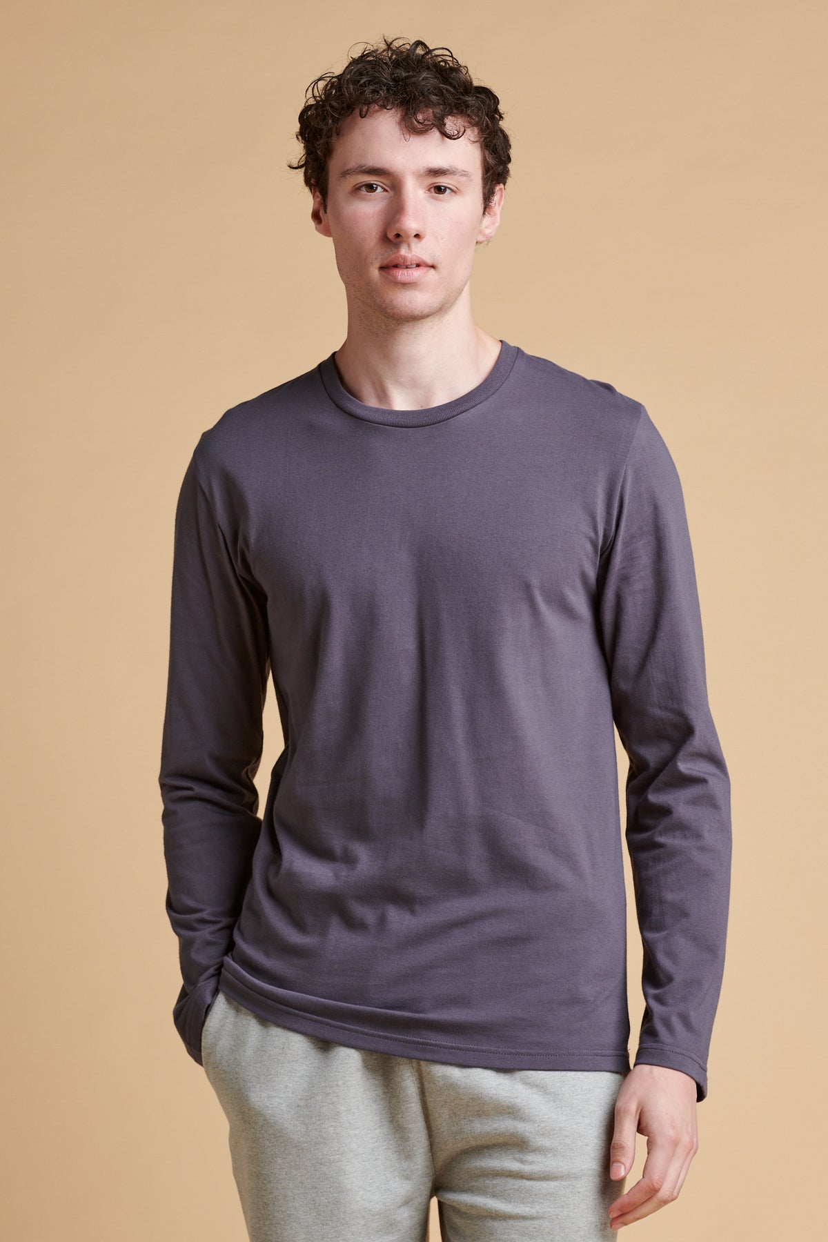 Male wearing long sleeve t-shirt in slate grey