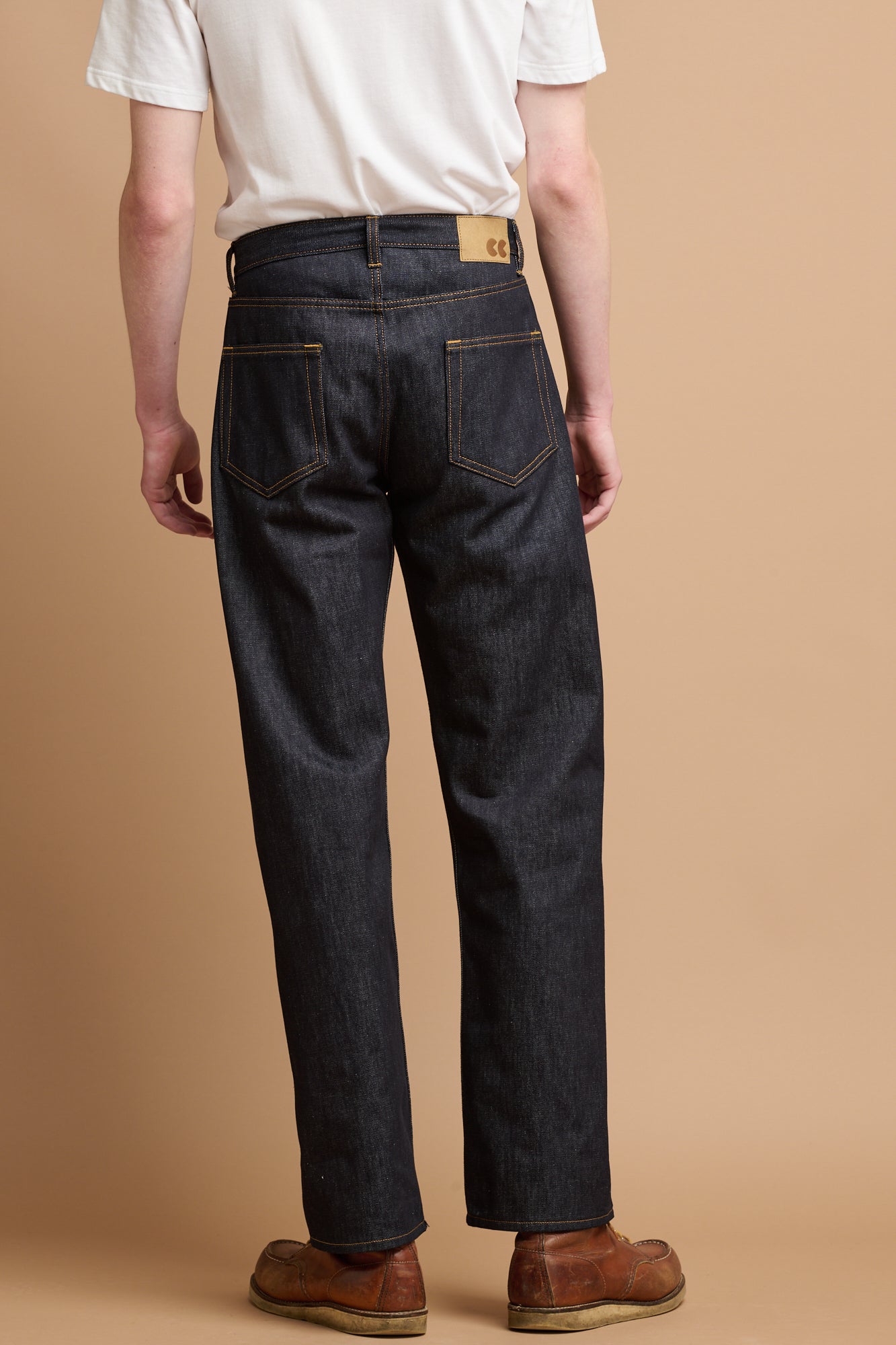 Male wearing selvedge denim jeans.