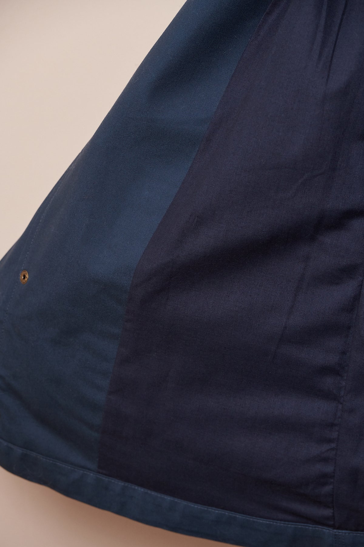 
            Inside lining of mountain parka in navy 