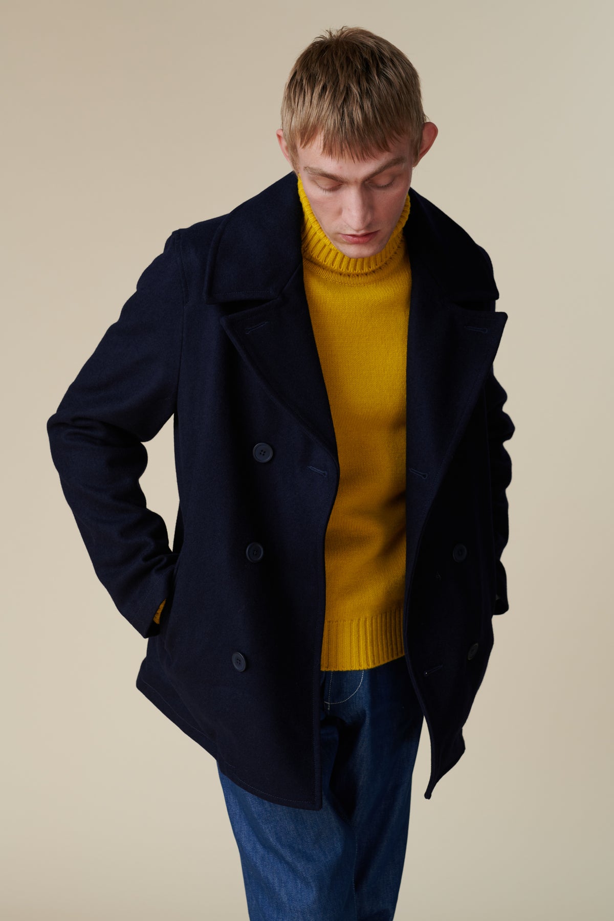 Male wearing pea coat in navy