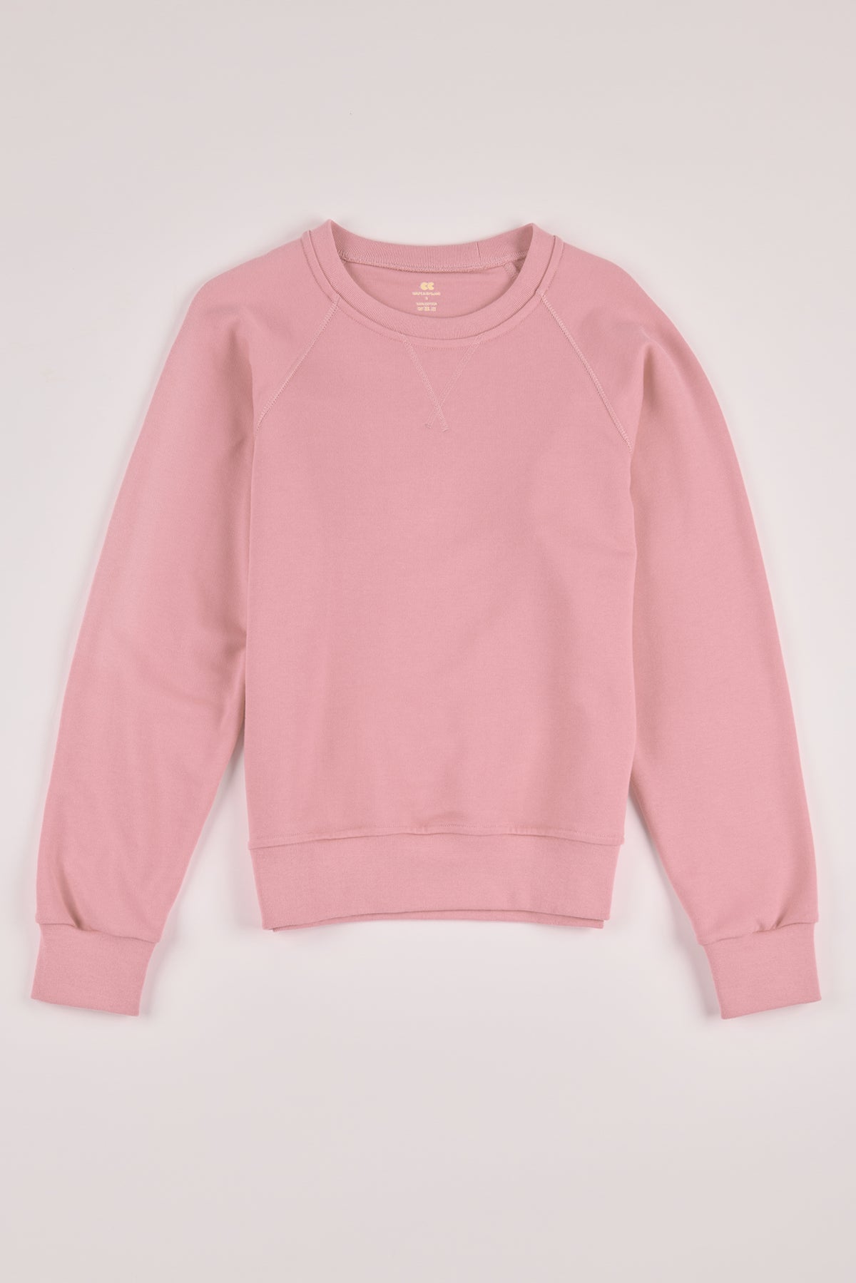 
            Flatlay product shot of men&#39;s raglan sweatshirt in pale pink