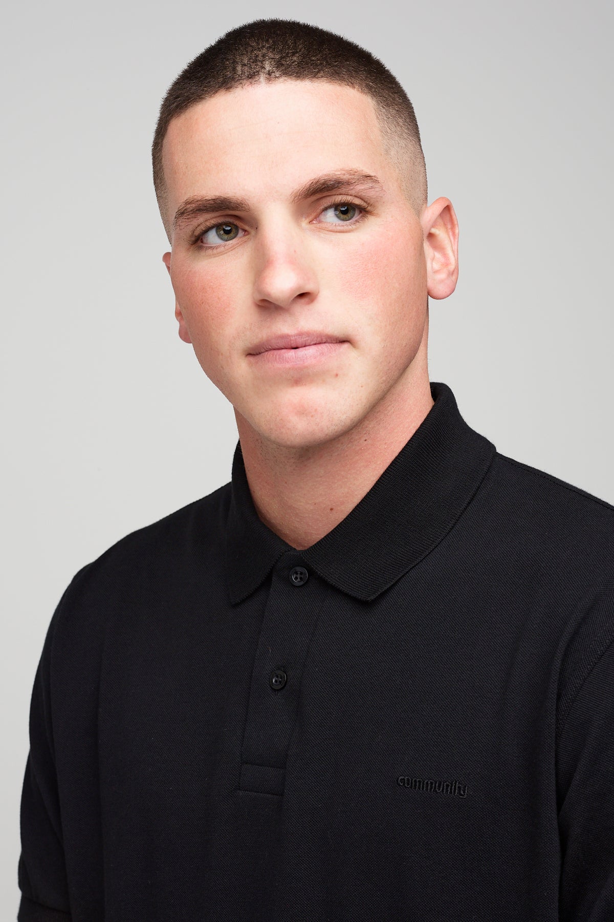 Male in short sleeve polo shirt - black