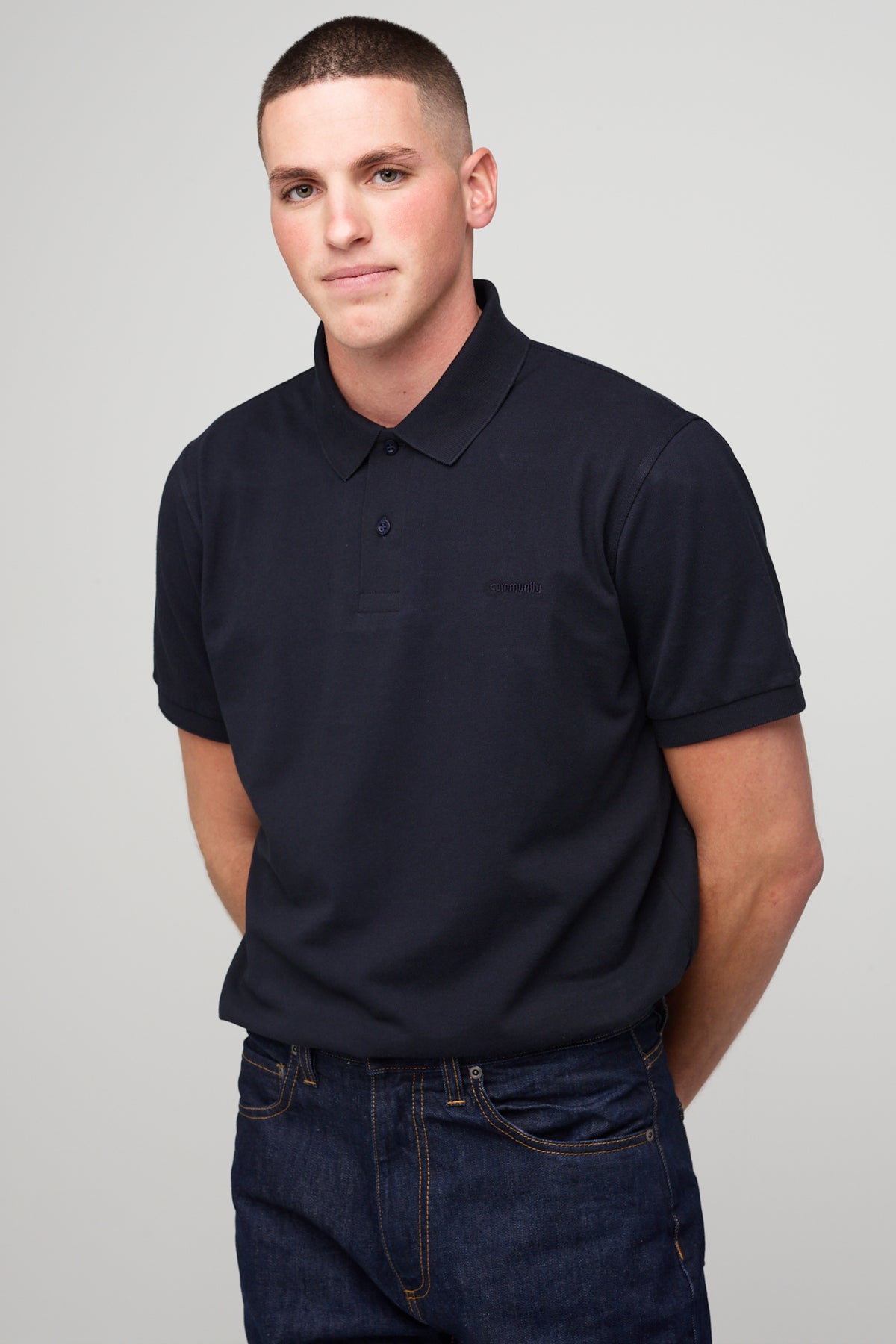 Brunet, white male in Short Sleeve Polo Shirt - navy