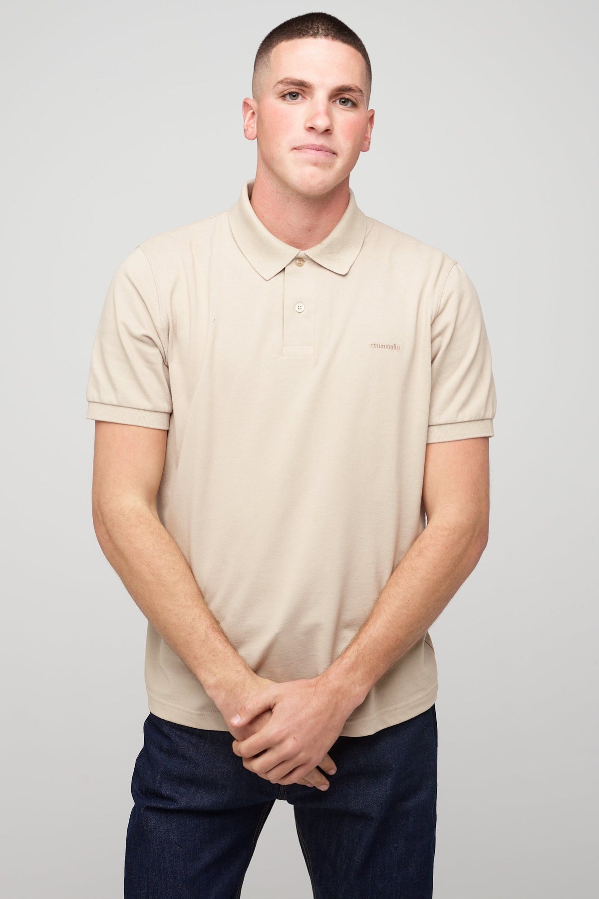 Brunet, white male in Short Sleeve Polo Shirt - Stone