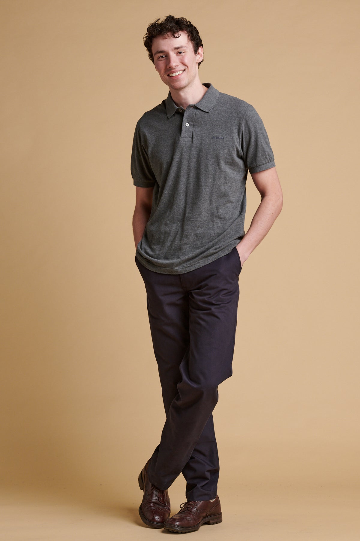 Male wearing slim heavyweight cotton twill chinos in dark navy.
