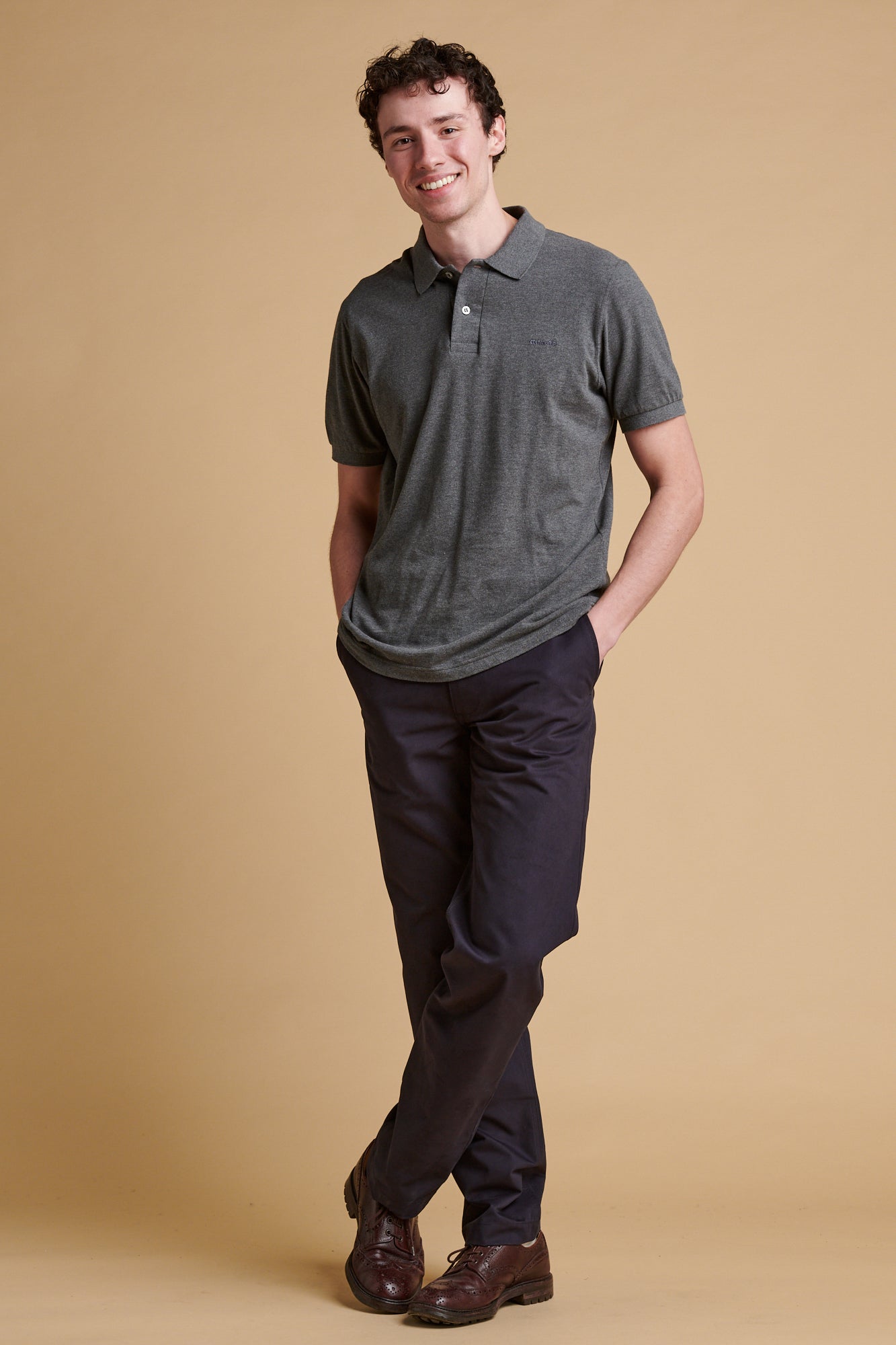 Male wearing slim heavyweight cotton twill chinos in dark navy.