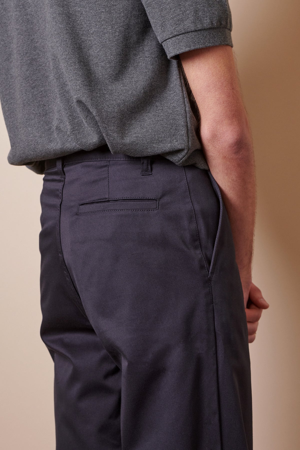 Image showing back pocket of male wearing Men's Slim Stretch Chino in navy