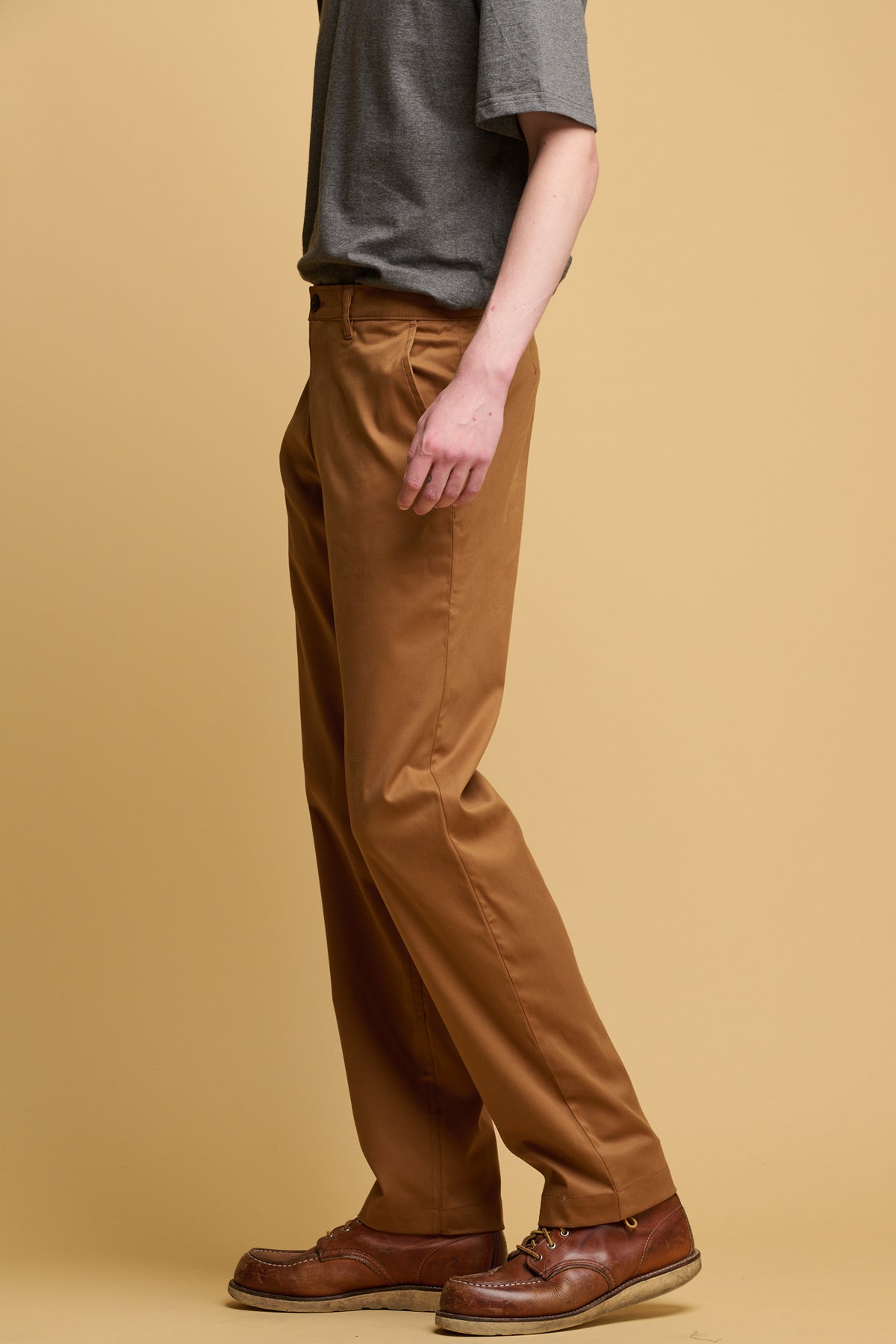 Side of male wearing slim stretch chino in tobacco
