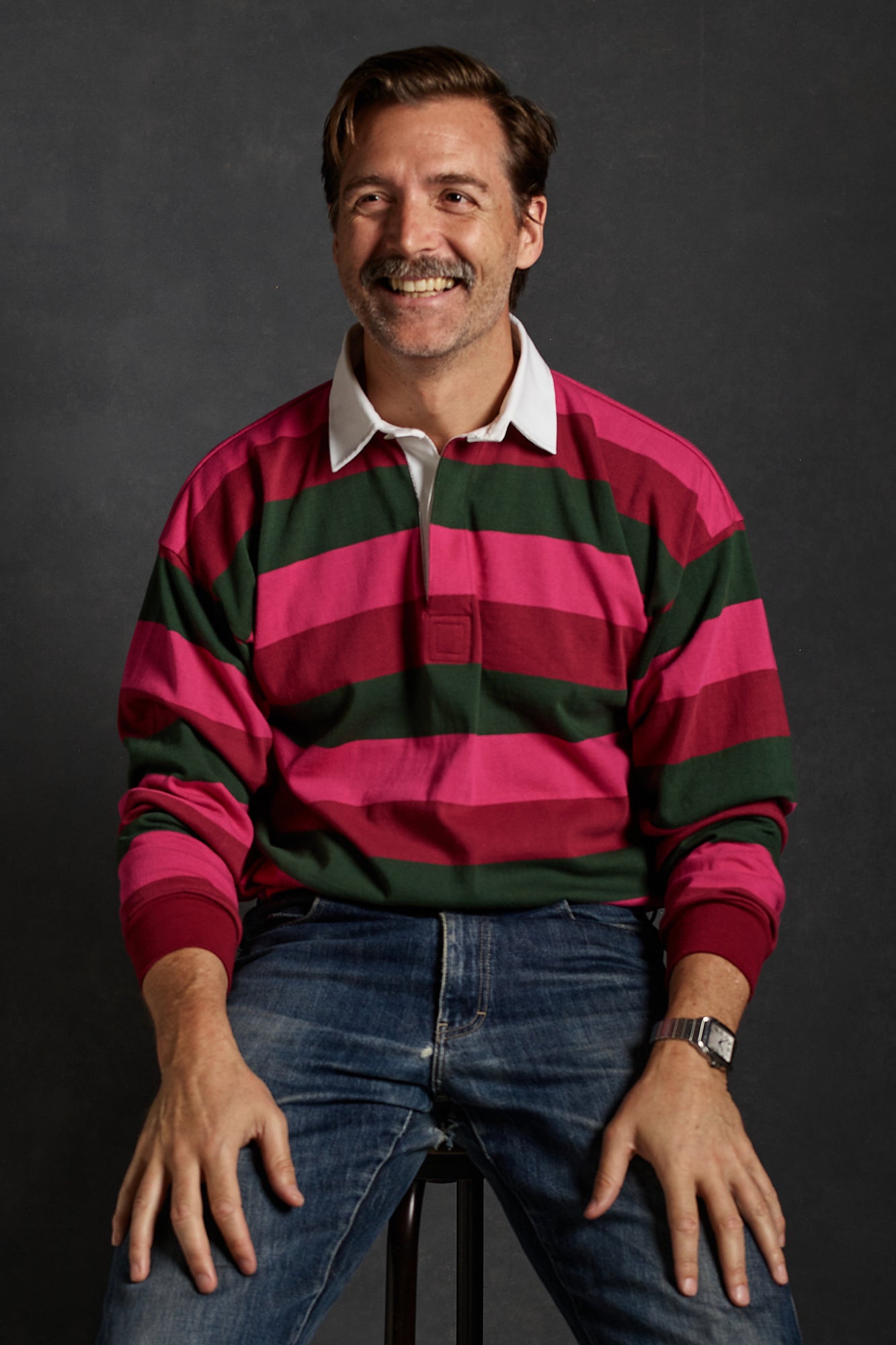 Patrick Grant wearing unisex striped rugby shirt maroon, bottle green, cerise