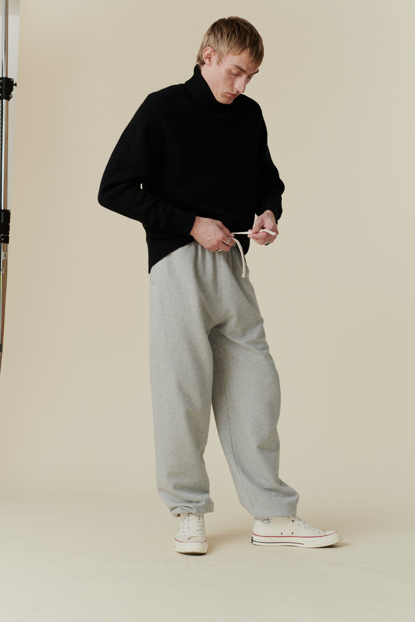 Male wearing sweatpants in grey marl