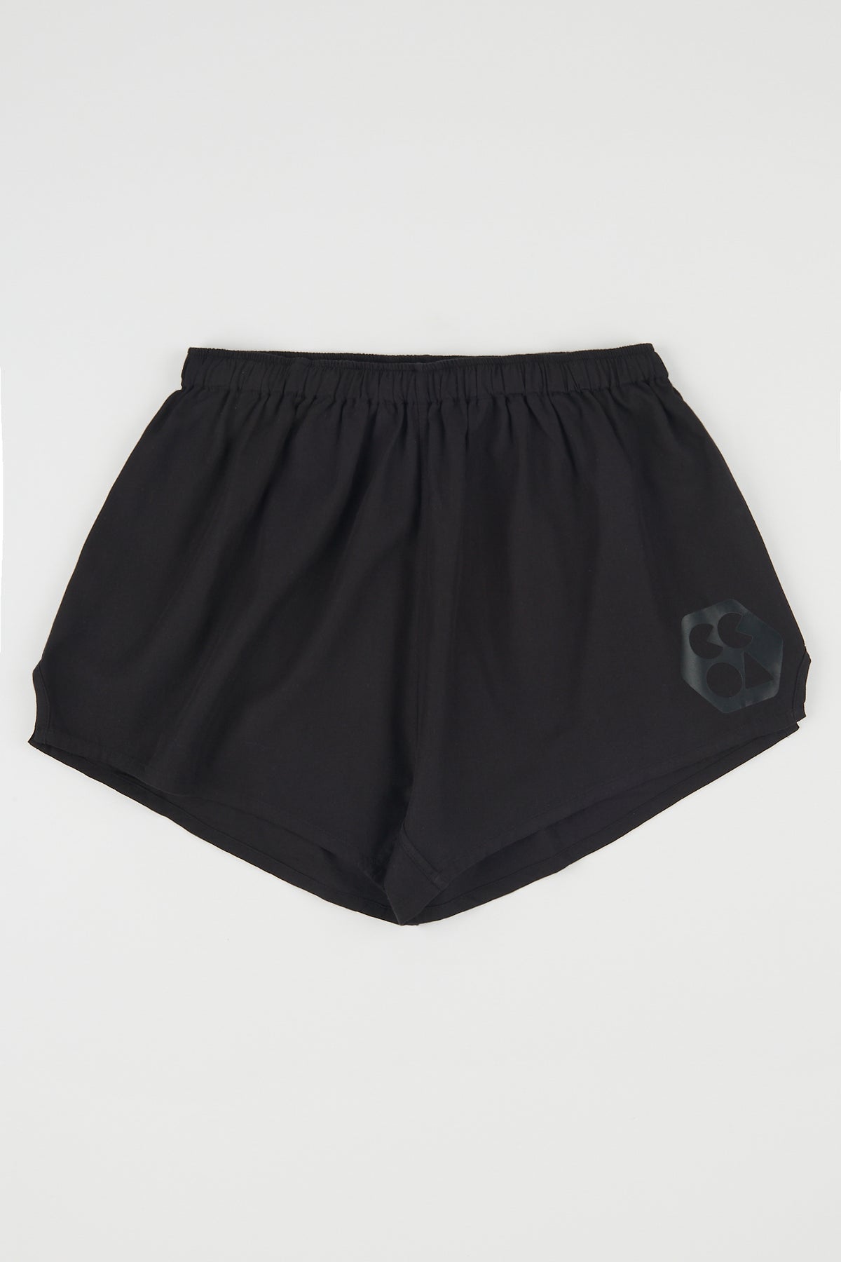 
            Flatlay product shot of men&#39;s lightweight sports short plastic free in black with CCOA logo