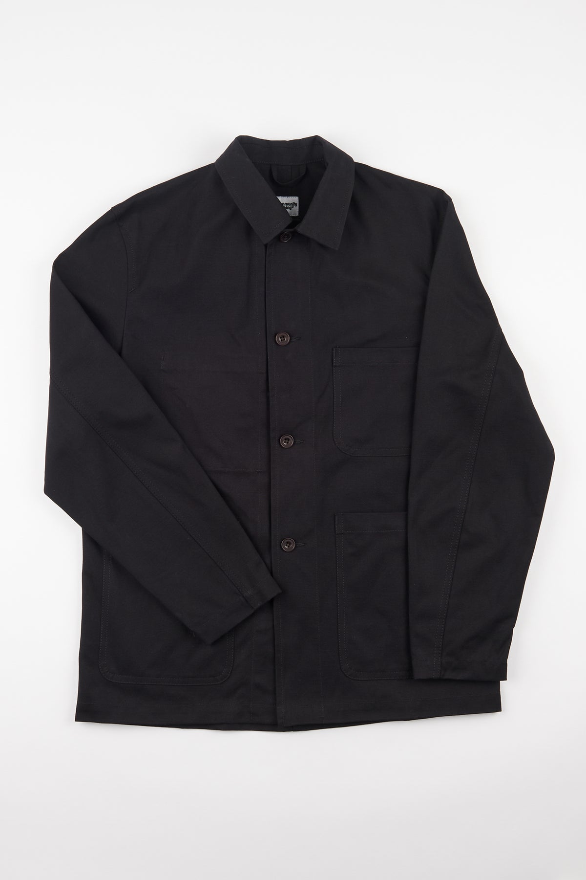 men's canvas chore jacket in black flatlay