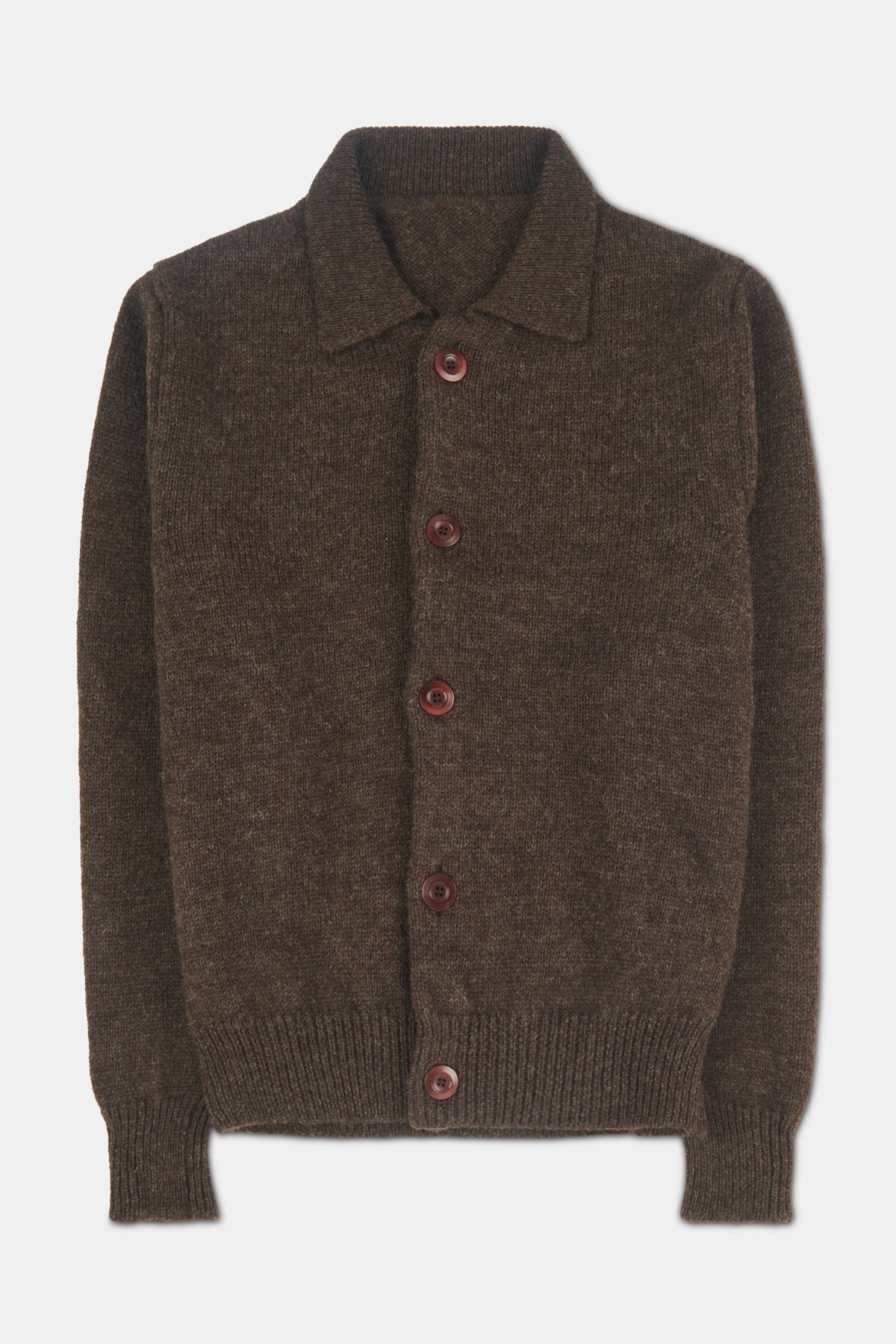 Brown knitted cardigan with buttons on a white background