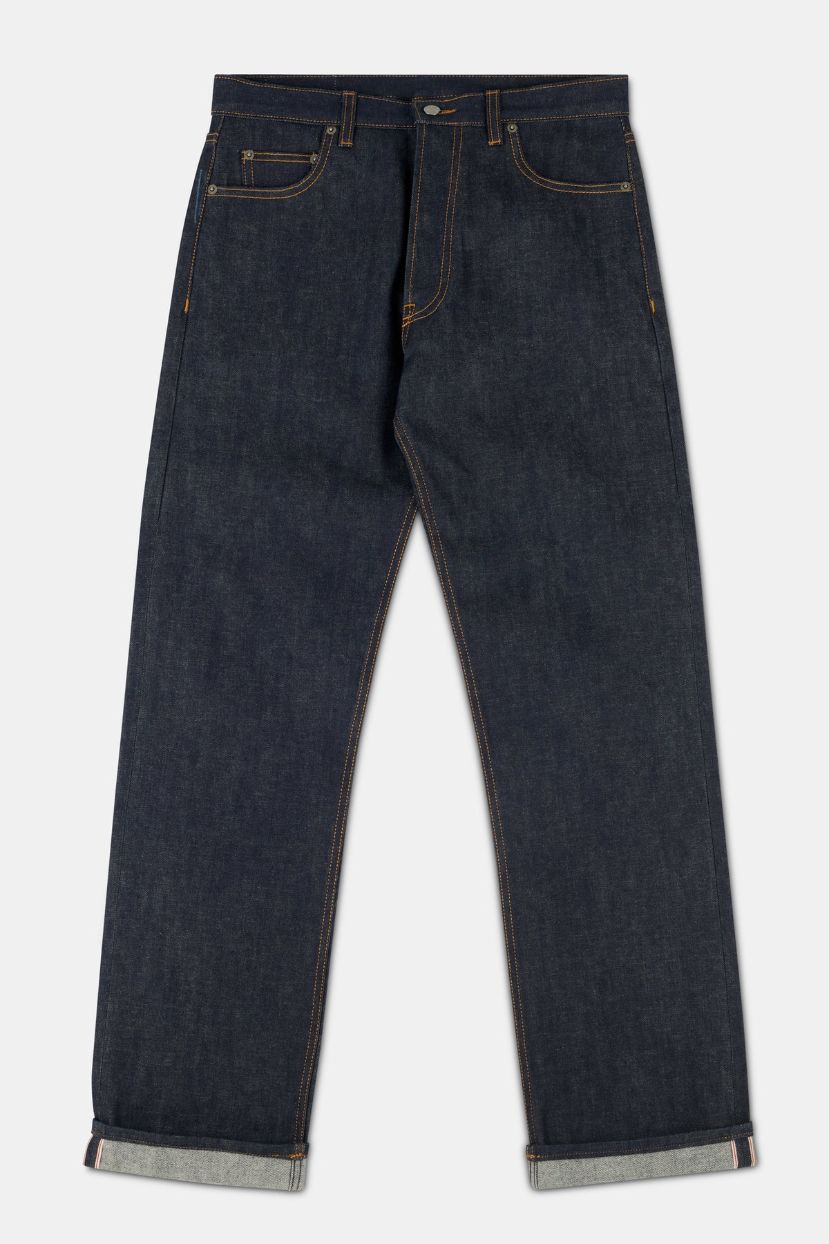 Pair of indigo denim jeans on a white background.