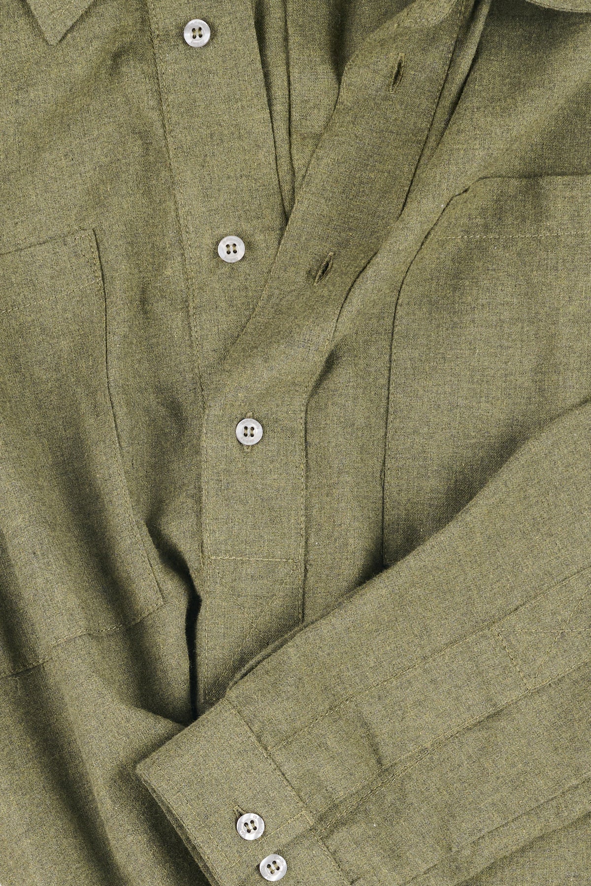 Close-up of olive green shirt with buttons