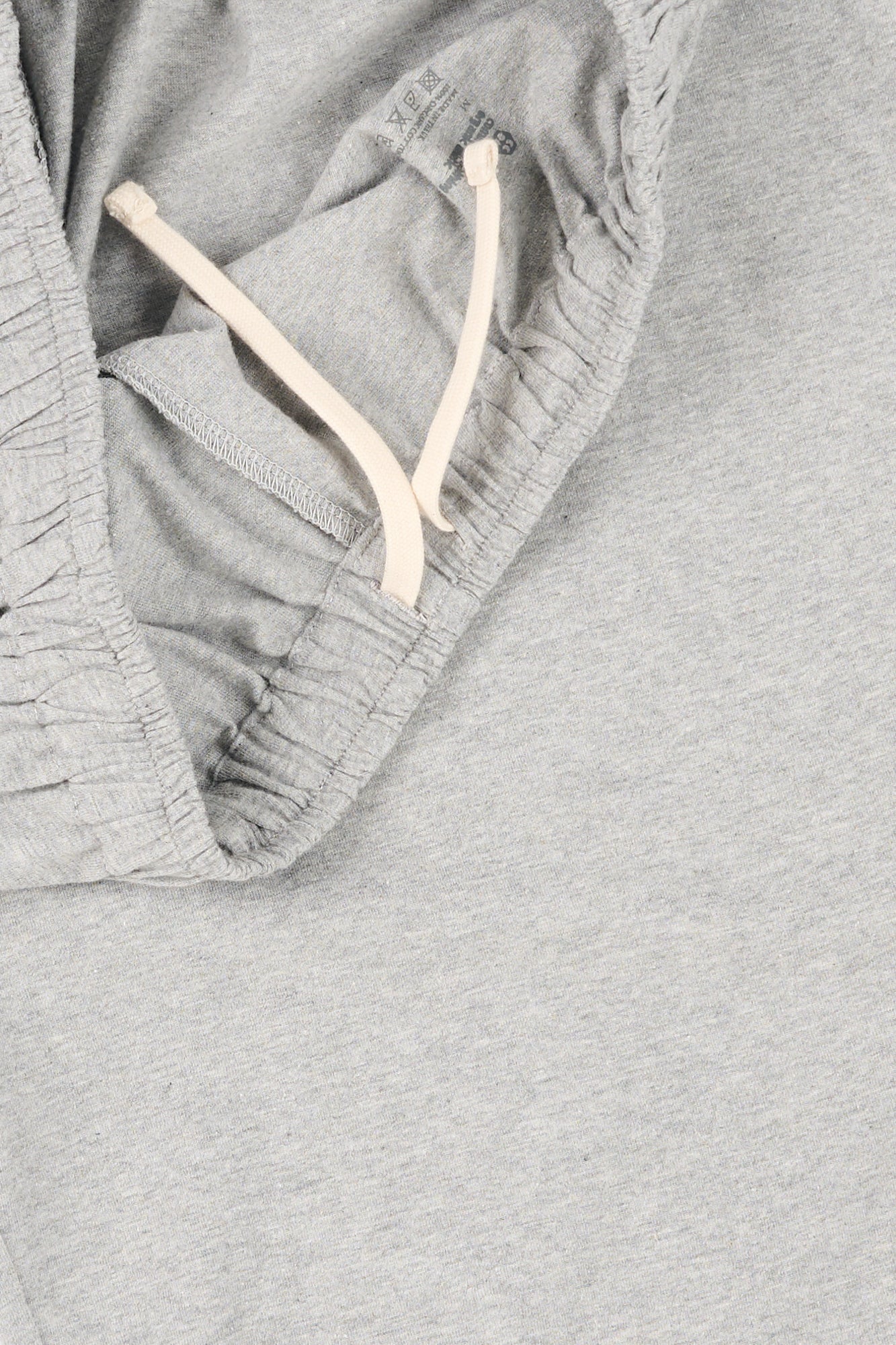 Close up of grey pyjamas with a drawstring 