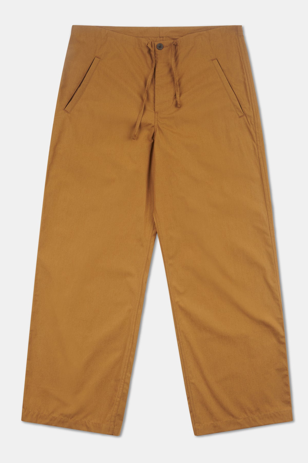 Tan trousers on pale grey background.