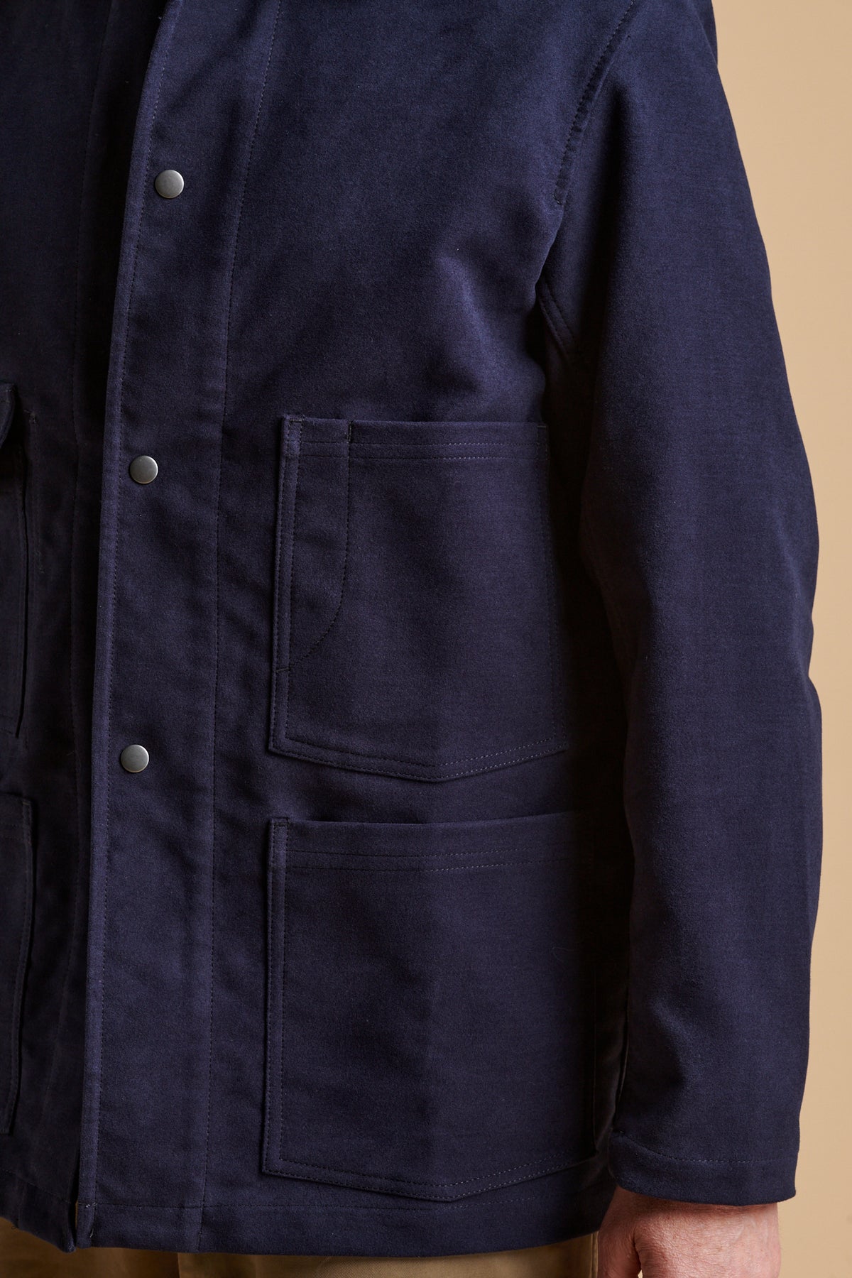 Front pocket details on Carter moleskin chore jacket.