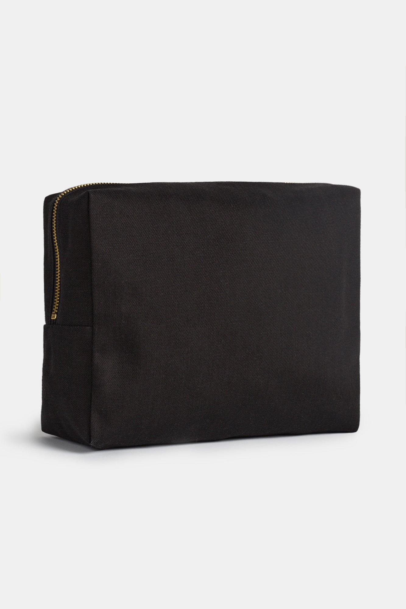 Image of the back of medium sized zip pouch 