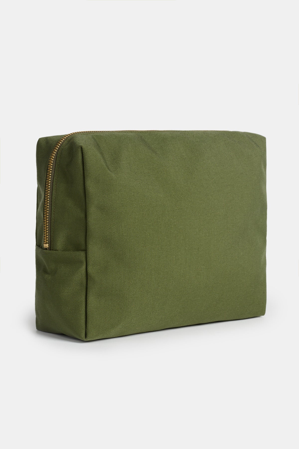 
             Image of the back of medium sized green pouch, showing depth and gold zip 