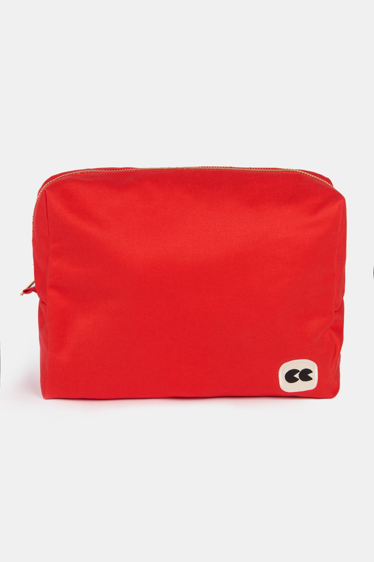 
            the front of pouch in red with CC logo patch on the bottom right corner of pouch.