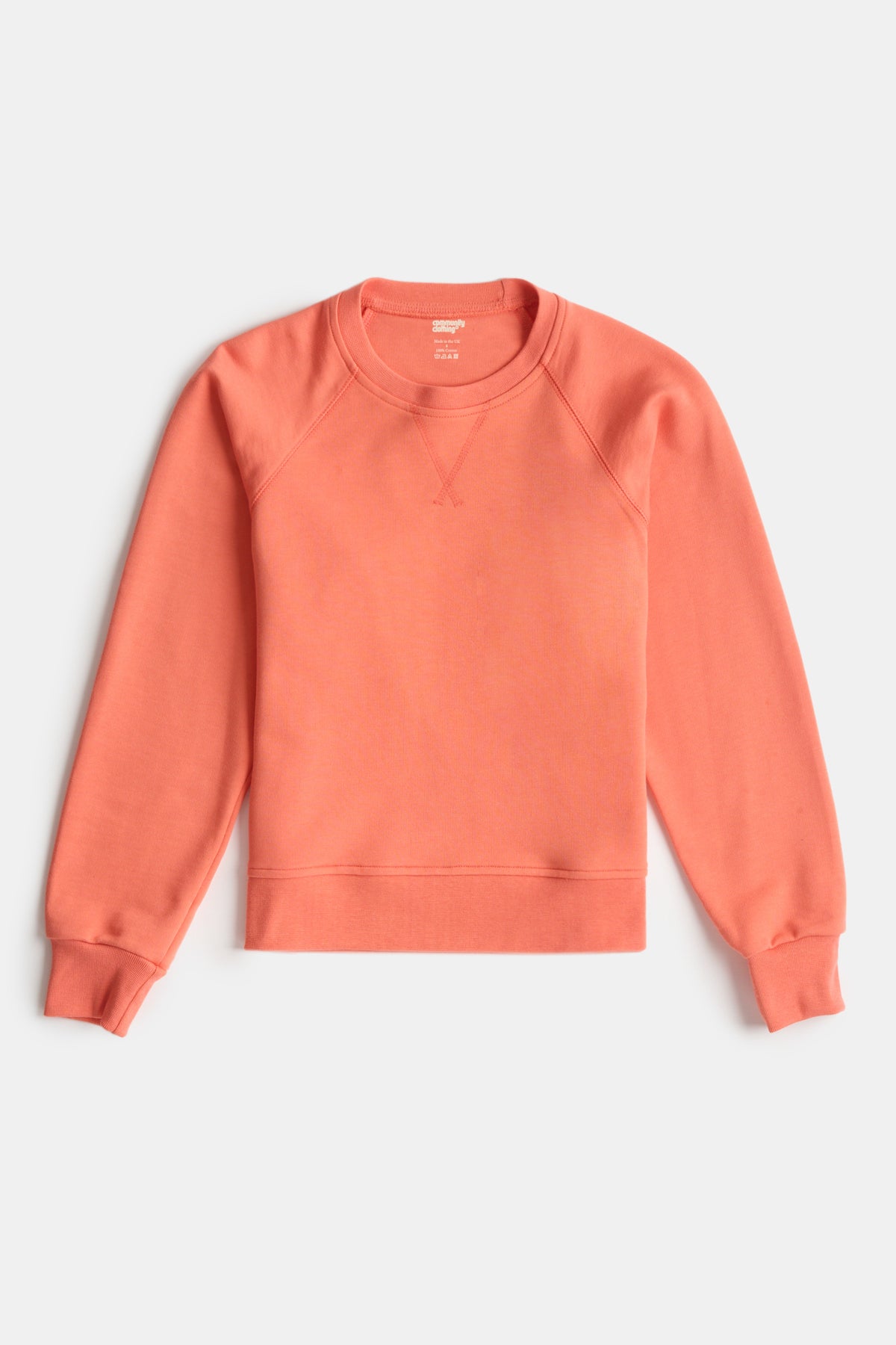 Men's Raglan sweatshirt in peach flatlay