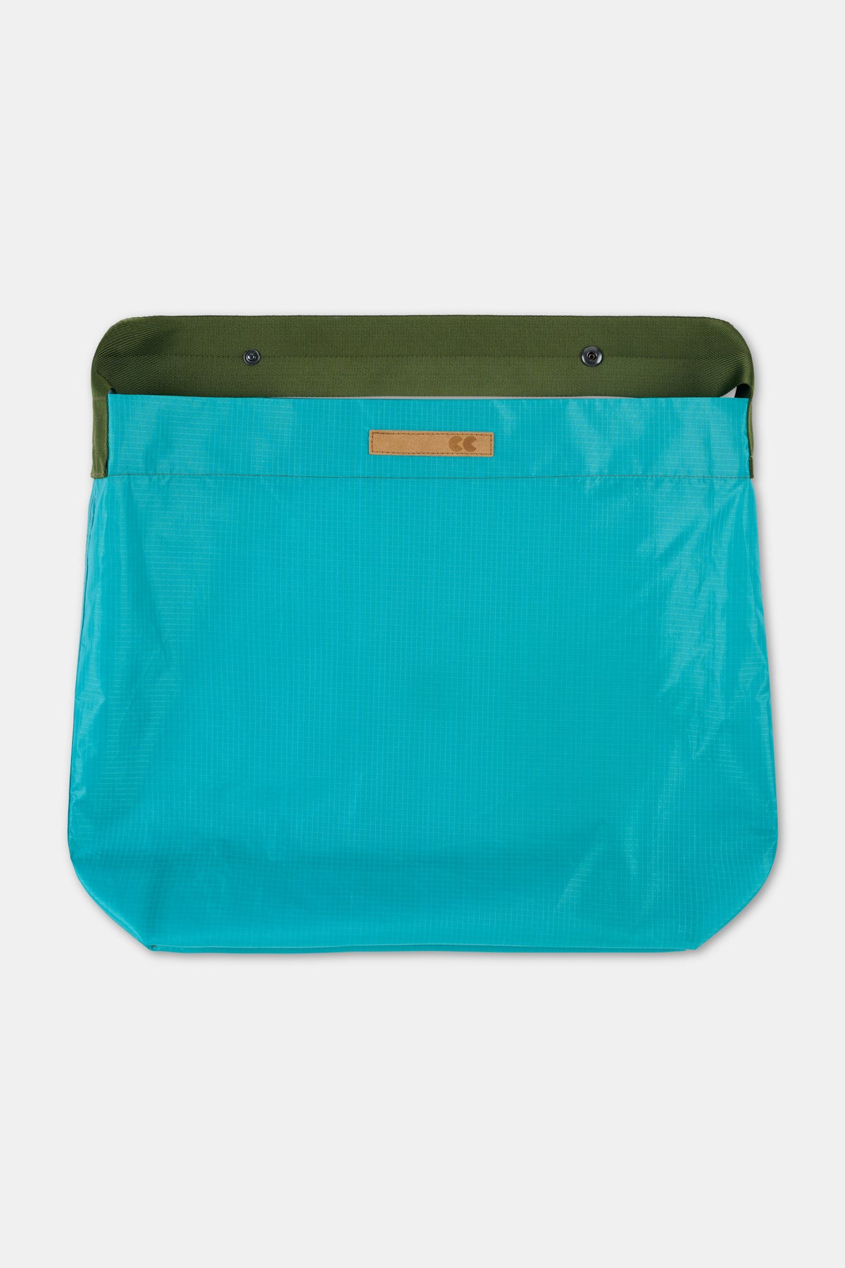 Teal bag with green strap on a white background