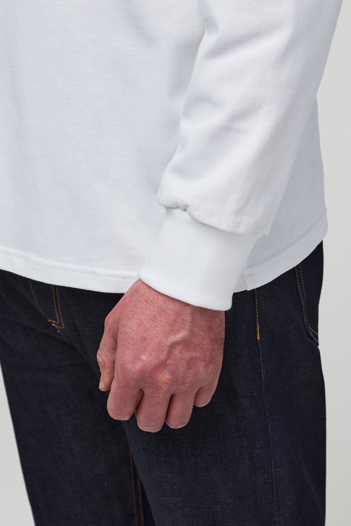 
            Cuff detail on the sleeves of rugby shit in white