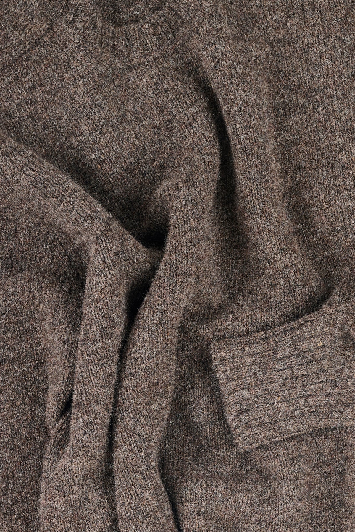 Close up of texture and colour of shetland jumper.