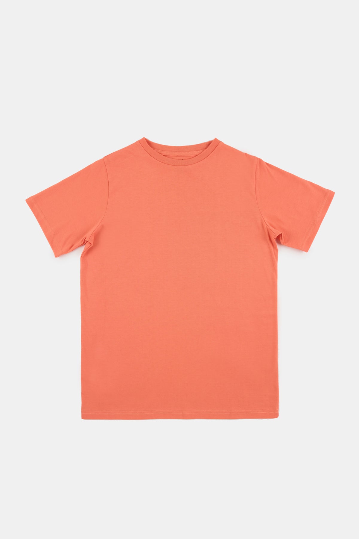 
            Flatlay product shot of short sleeve t shirt in peach