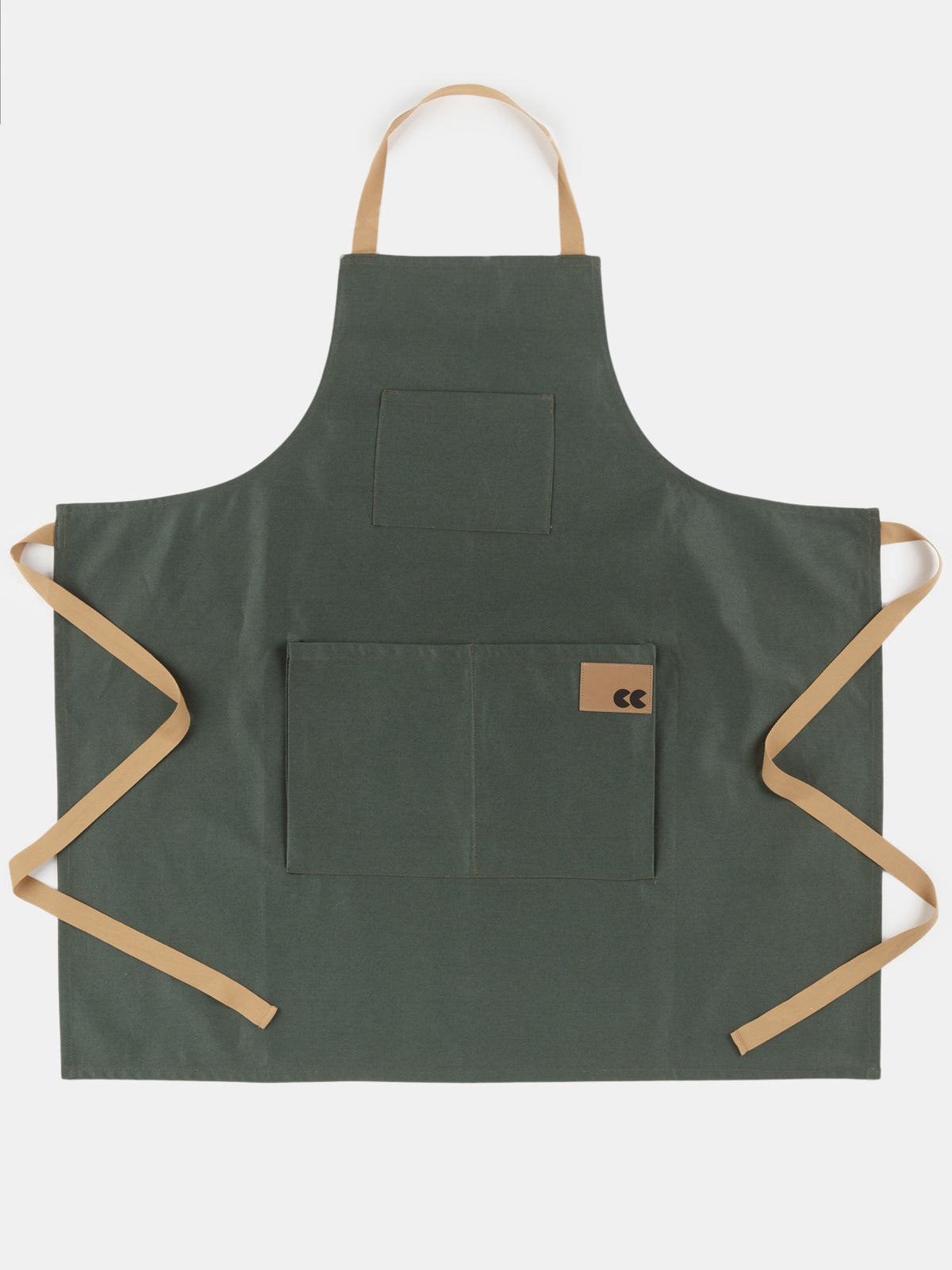 
            Flatlay of unisex apron in forest