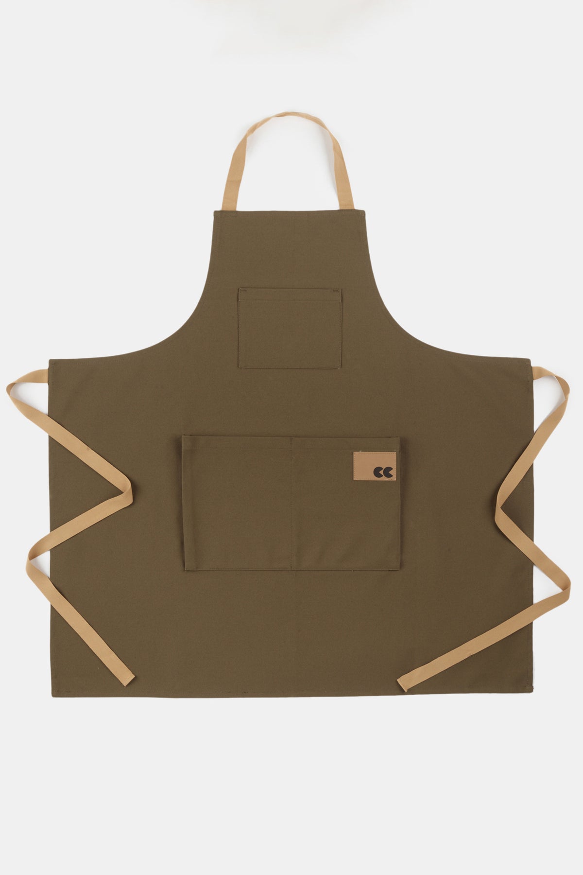 
            Flatlay image of apron in olive, three from pockets and CC logo patch, beige ties