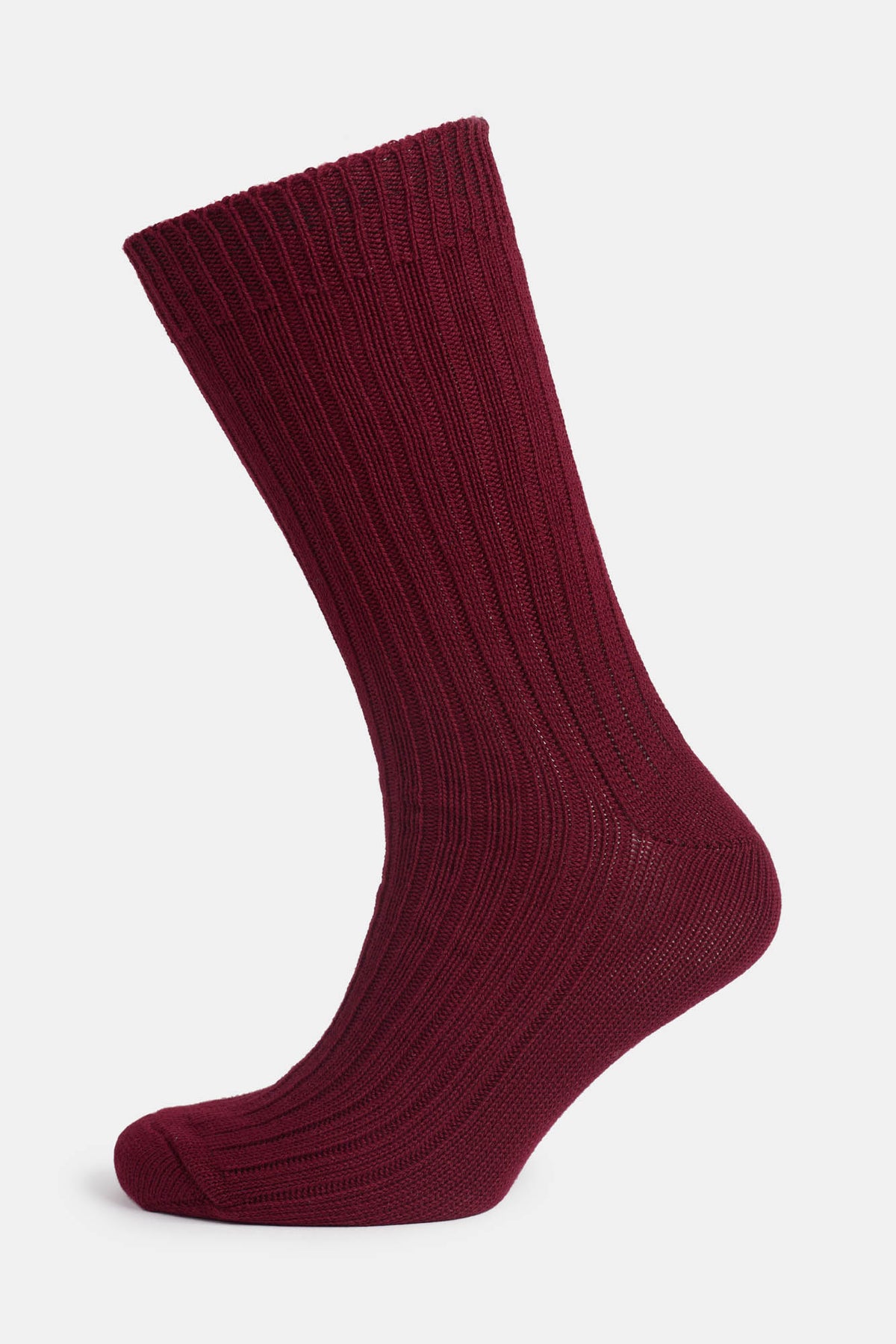 Ghost mannequin shot of a community clothing premium ribbed cotton sock in Burgundy.