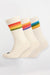 Product shot of sports cotton calf sock 3 pack in ecru, each pair having different rainbow coloured stripes. Black CC logo on toe