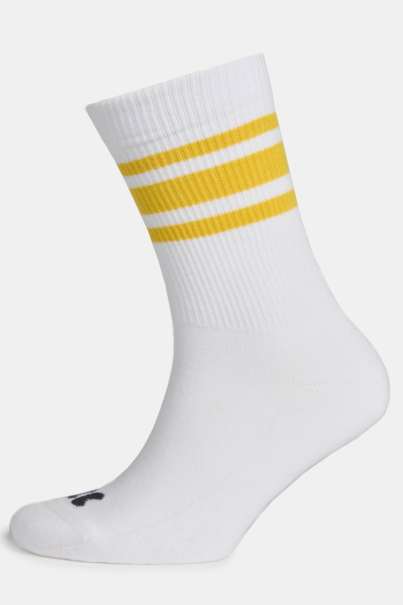 Image of sports cotton sock in white with canary yellow stripe on ghost mannequin, CC logo on the toe