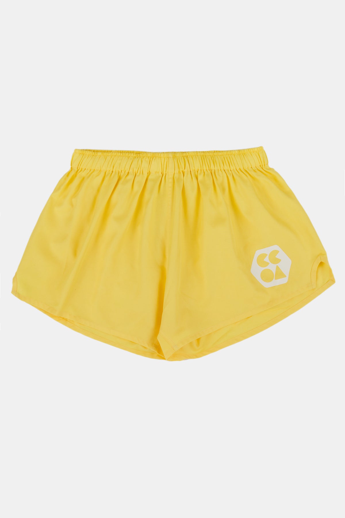 Flatlay product shot of women's lightweight sports short plastic free canary yellow with CCOA logo