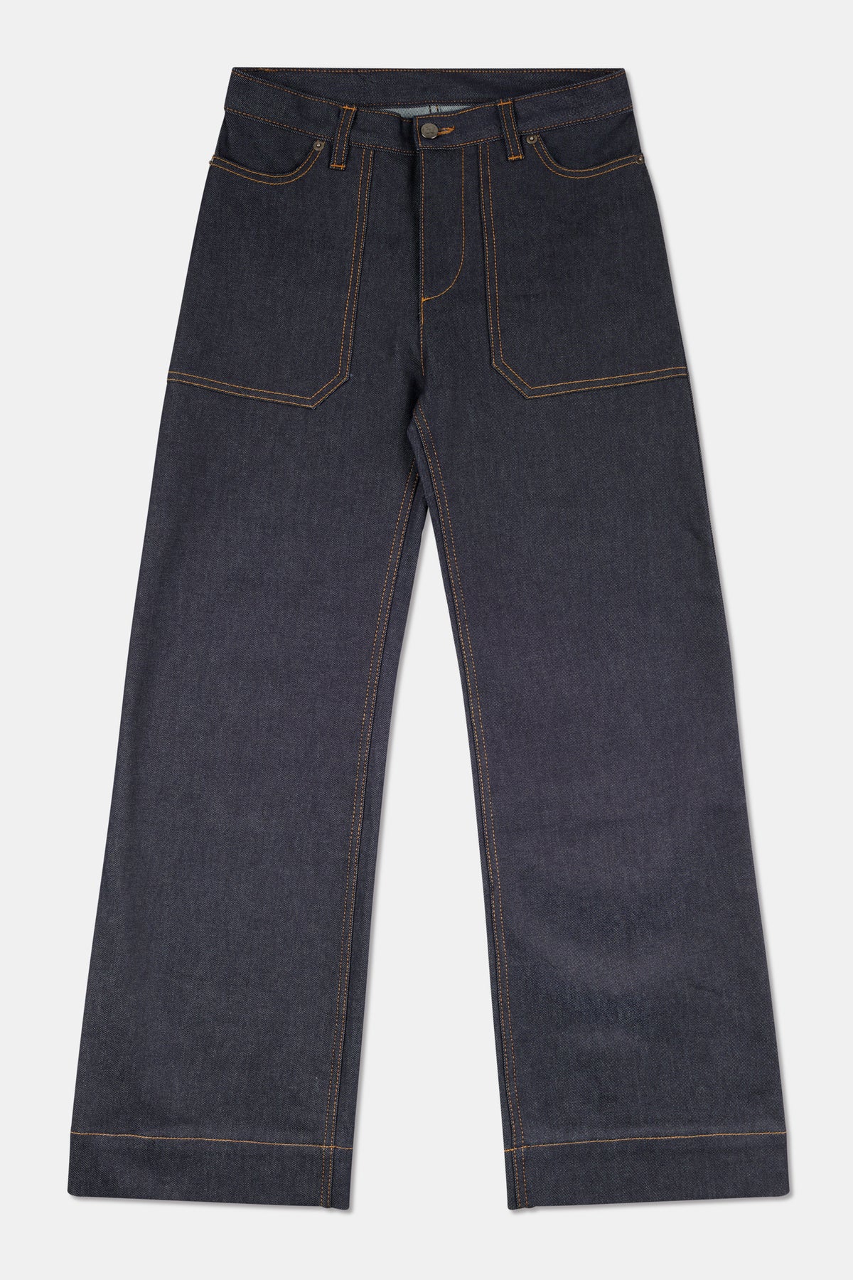 Indigo jeans with tobacco coloured stitching on white background.