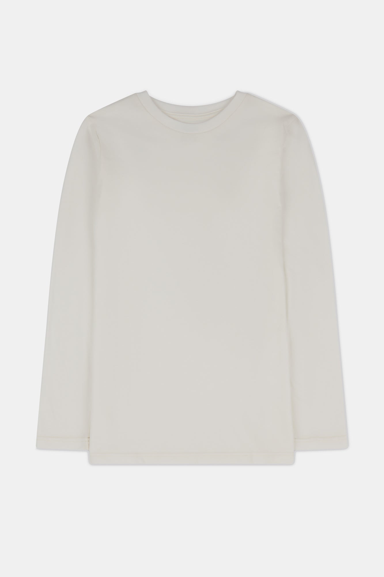 Cream coloured long sleeve t shirt on white background.