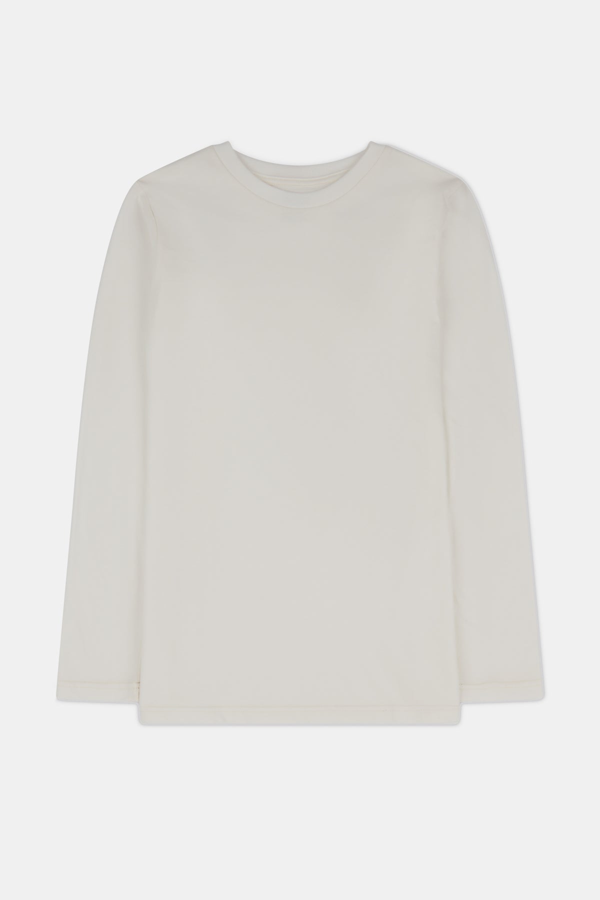 Cream coloured long sleeve t shirt on white background.