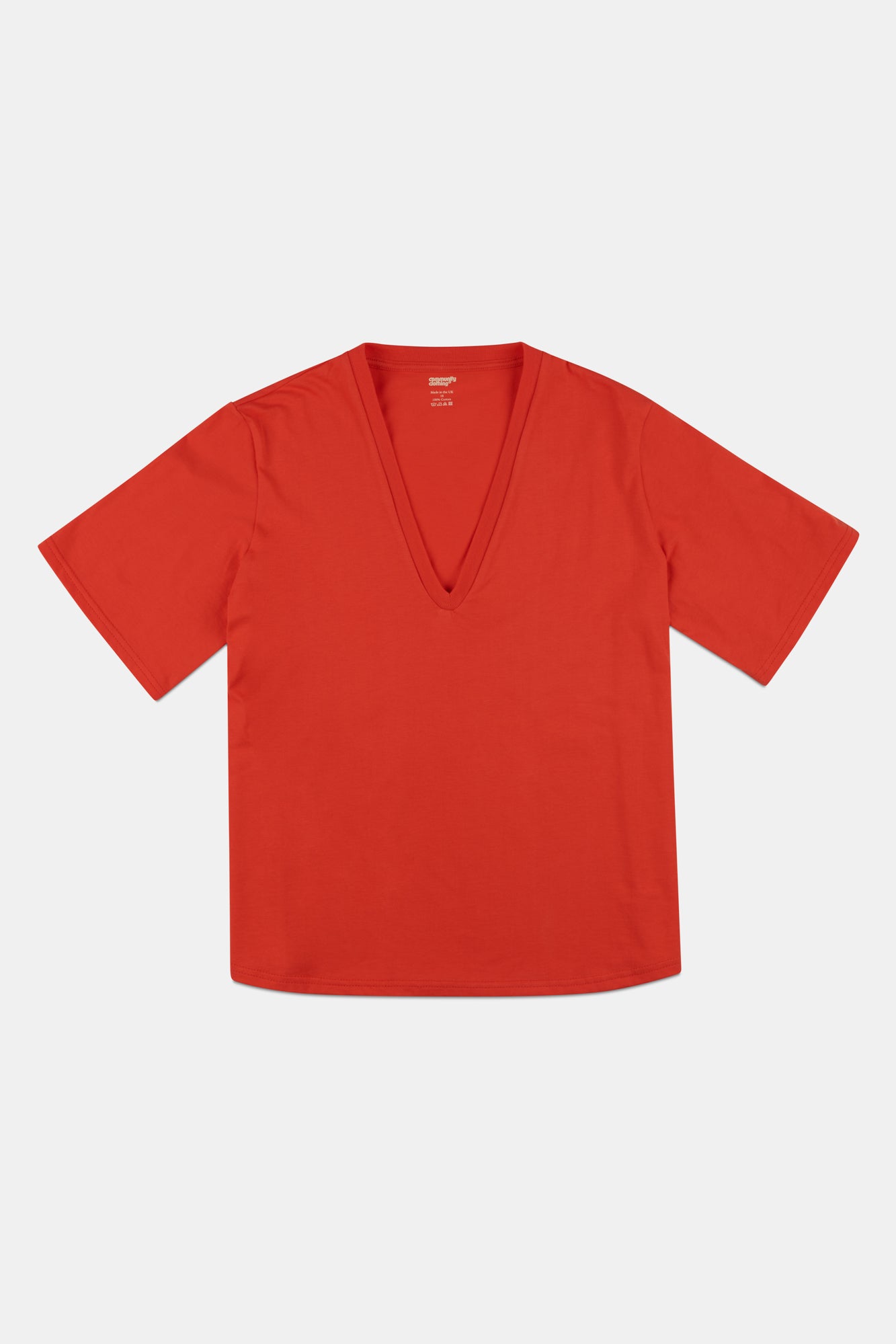 Flatlay of women's short sleeve v neck t shirt in flame red.